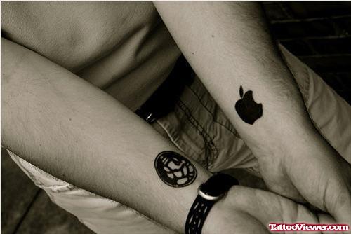 Ganesha and Apple Tattoos on Wrist