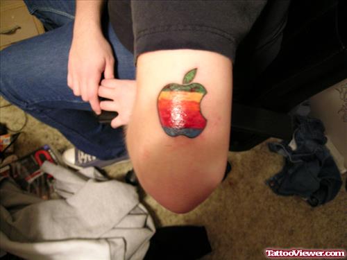 Colorful Apple Tattoo On Left Bicep