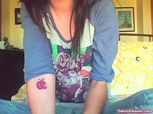 Purple Apple Tattoo On Right Arm