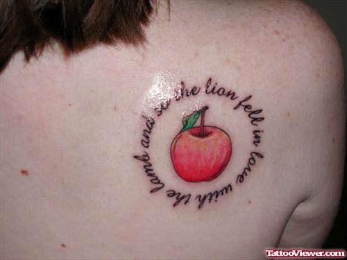 Lettering and Apple Tattoo On Right BAck Shoulder