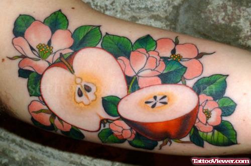 Flowers and Cut Apple Tattoo
