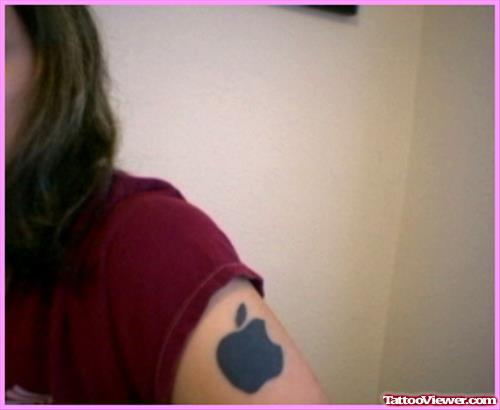 Black Apple Tattoo On Left Shoulder