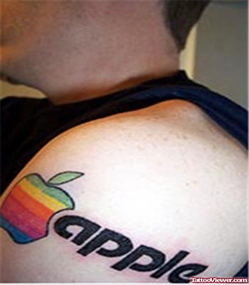 Colored Apple Tattoo On Man Left Shoulder