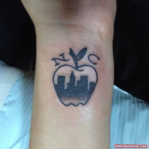 Awesome Grey Ink Apple Tattoo On Left Wrist