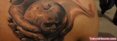 Grey Ink Rotten Apple Tattoo On Shoulder