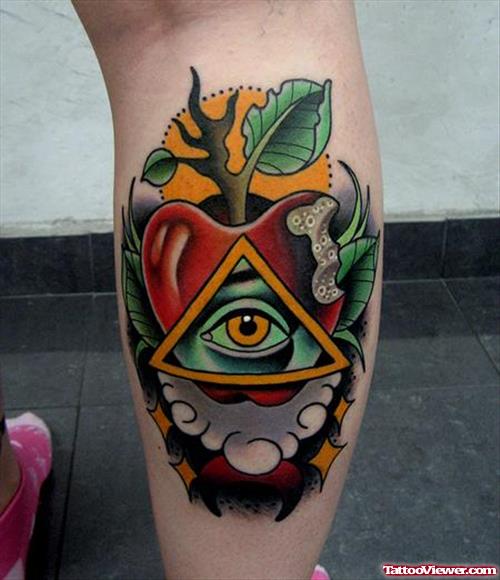 Illuminati Eye and Apple Tattoo On Back Leg