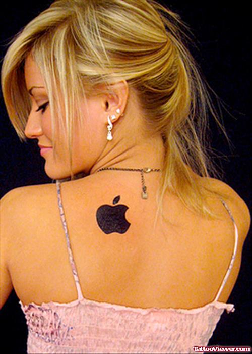 Black Apple Tattoo On Back Shoulder