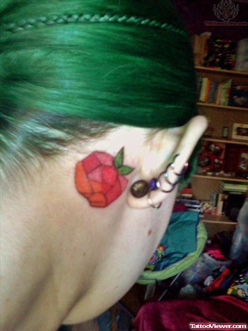 Crystal Apple Tattoo Behind Ear