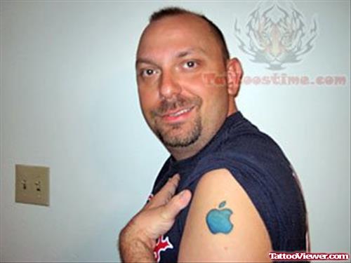 Blue Ink Apple Logo Tattoo On Bicep