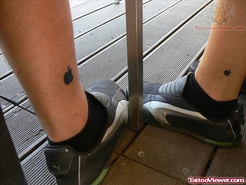 Apple Tattoo On Both Legs