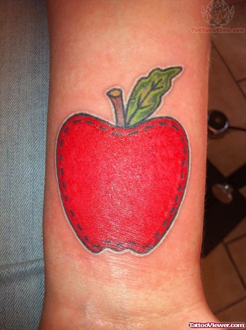 Red Apple Tattoo On Wrist
