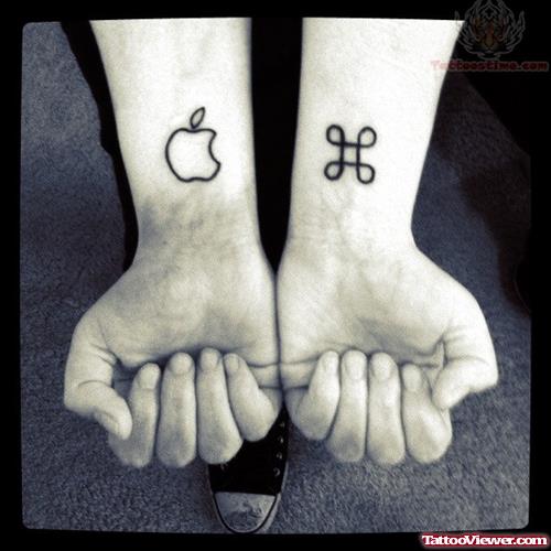 Apple And New Tattoo On Wrists