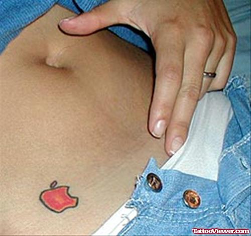 Red Apple Logo Tattoo On Hip