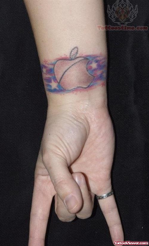 Apple And stars Tattoo On Wrist