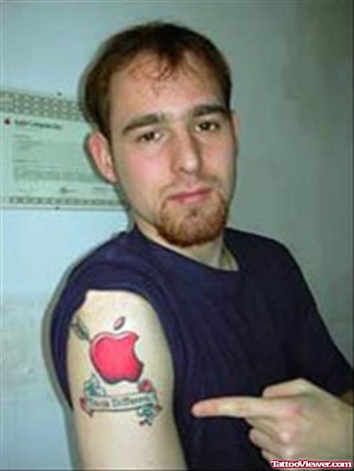 Red Apple Logo Tattoo On Bicep