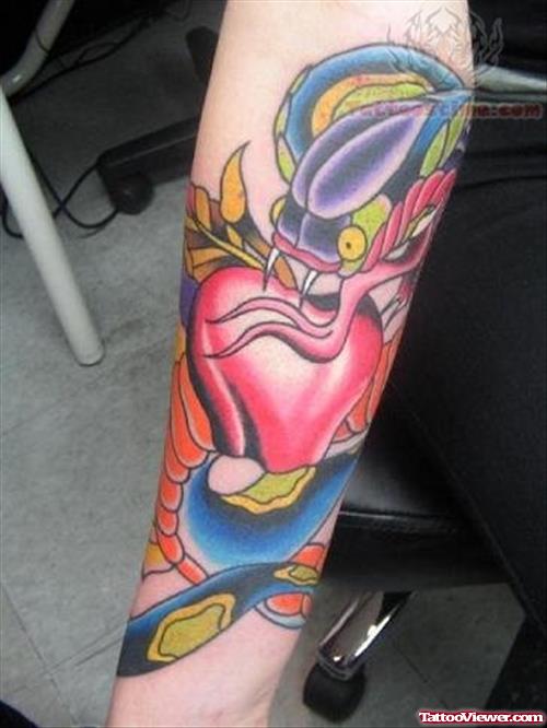 Red Apple And Angry Snake Tattoo