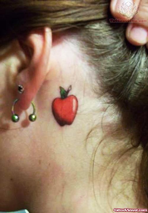 Apple Tattoo Behind Girl Ear