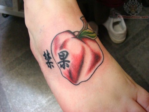 Kanji And Apple Tattoo On Foot