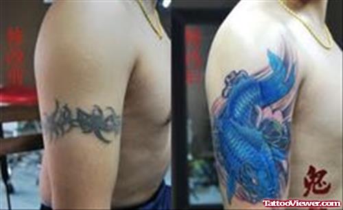 Blue Ink Aqua Fish Tattoo On Half Sleeve