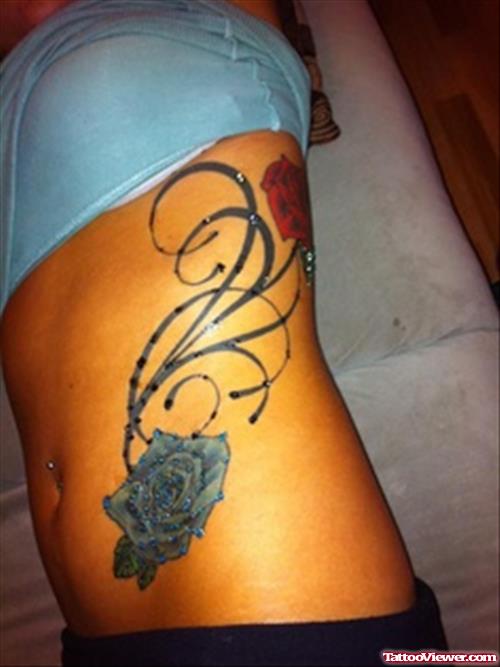 Blue Rose Aqua Tattoo On Side Rib