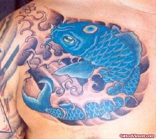 Amazing Aqua Blue Fish Tattoo On Chest