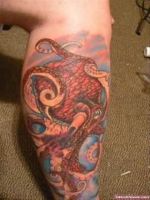 Aqua Tattoo On Right Leg