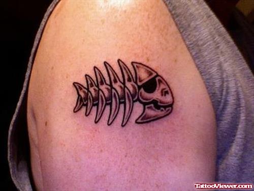 Aqua Fish Skeleton Tattoo On Bicep