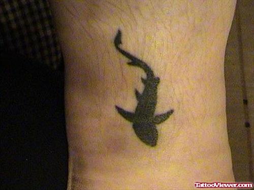 Black Aqua Tattoo On Arm