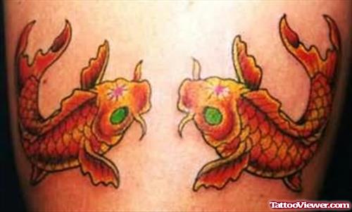Aqua Fish Tattoos On Bicep