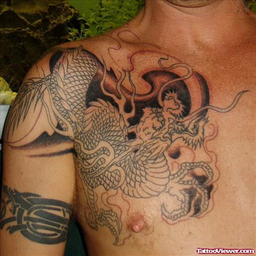 Grey Ink Chinese Aqua Tattoo On Man Chest