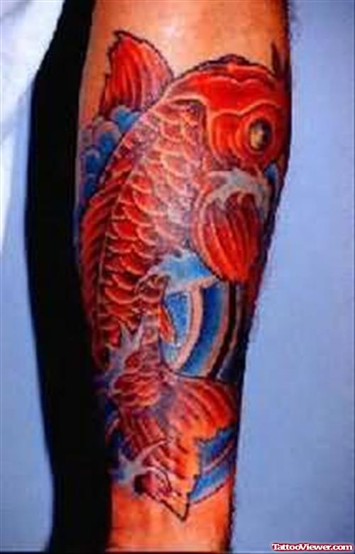 Aqua Red Tattoo On Arm