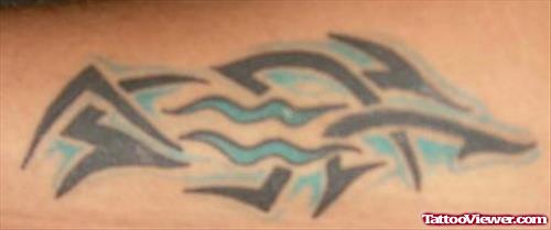 Black And Blue Tribal Aquarius Tattoo