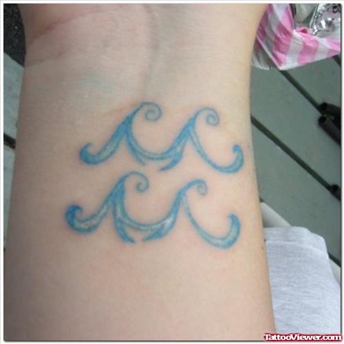 Beautiful Aquarius Tattoo On Wrist