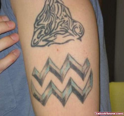 Tribal And Aquarius Symbol Tattoo On Half Sleeve