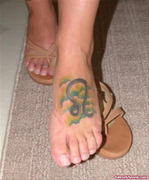 Leo And Aquarius Zodiac Sign Tattoo On Left Foot