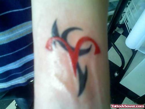 Tribal Red And Black Ink Aquarius Tattoo