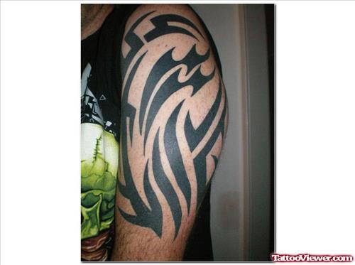 Left Half Sleeve Tribal Aquarius Tattoo