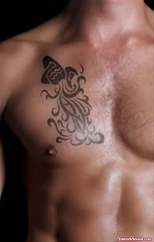 Black Tribal Aquarius Tattoo On Man Chest