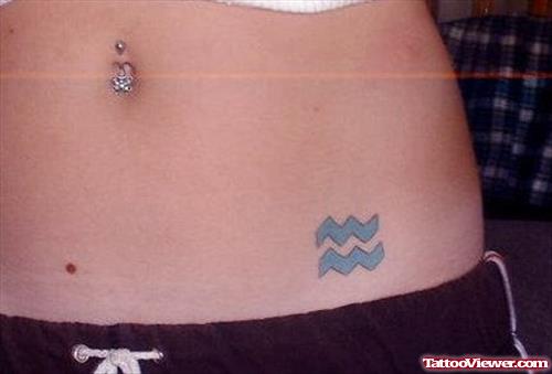 Aquarius Symbol Tattoo On Hip
