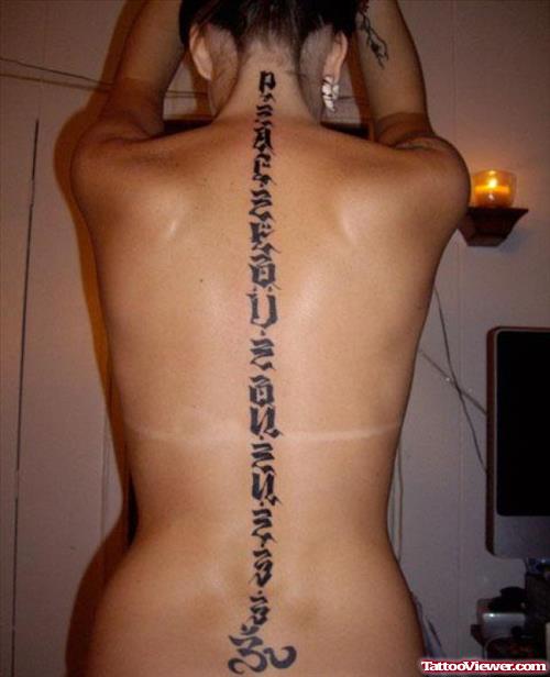 Arabic Tattoo On Girl Back Body