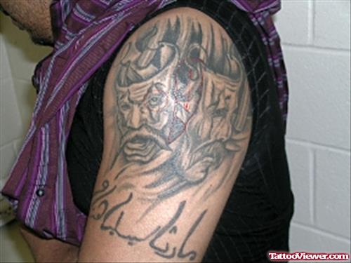 Attractive Arabic Tattoo On Left Shoulder