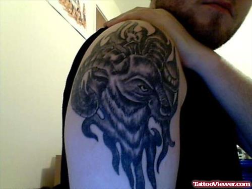 Grey Ink Aries Tattoo On Man Right SHoulder