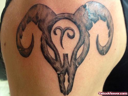 Grey Ink Aries Head Tattoo On Shoulder