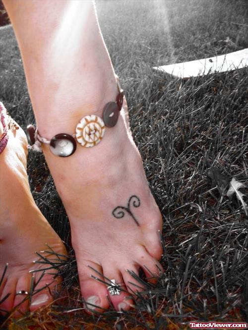 Girl With Aries Zodiac Tattoo On Left Foot