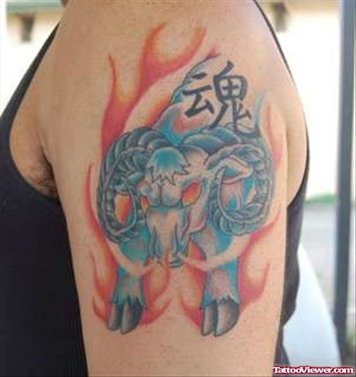 Blue Ink Zodiac Aries Tattoo On Left Shoulder
