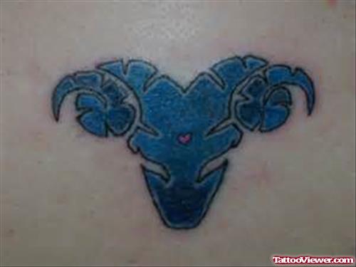 Blue Ink Tribal Head Aries Tattoo
