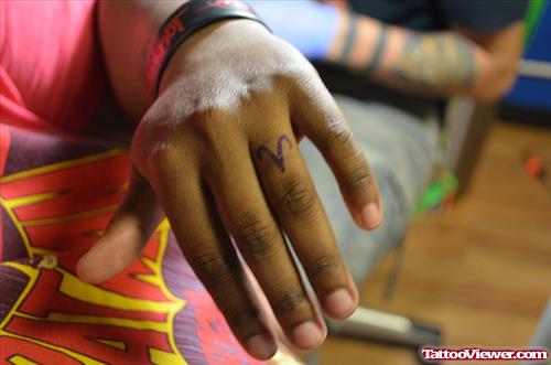 Small Aries Zodiac Sign Tattoo On Finger