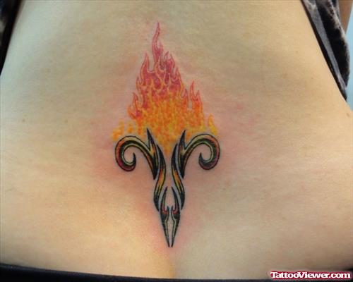 Flaming Tribal Aries Tattoo On Lowerback