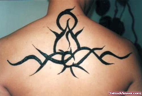 Amazing Black Ink Tribal Aries Tattoo On Upperback