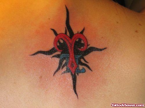 Black Tribal And Red Ink Aries Tattoo